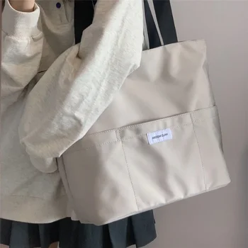 여자 끈달린 가방 심미적인 솔리드 컬러는 학생들 캐주얼 핸드백을 어깨에 매는 가방 큰 용량 옥스포드에 재사용할 수 있는 쇼핑 비치 가방 2022