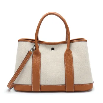 캔버스 올려 놓 가방 여성용 핸드백을 어깨에 매는 가방에 대한 유명 브랜드의 새로운 높은 품질의 디자이너와 고급 가죽 어깨끈이